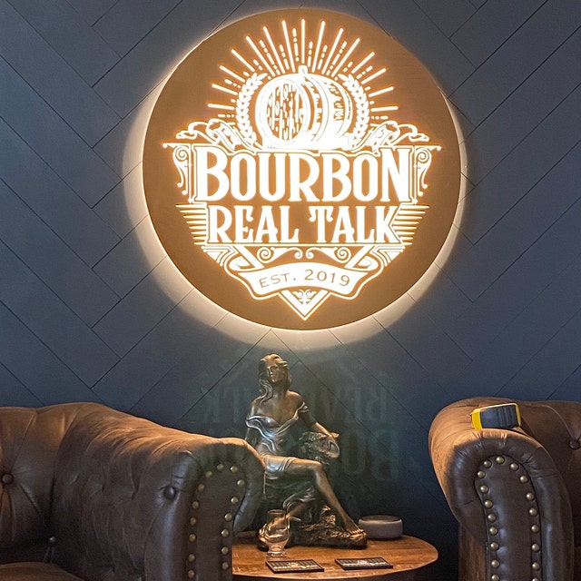 Illuminated light box sign on a storefront
